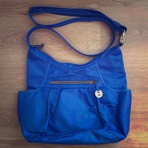 Blue Travelog anti-theft shoulder bag